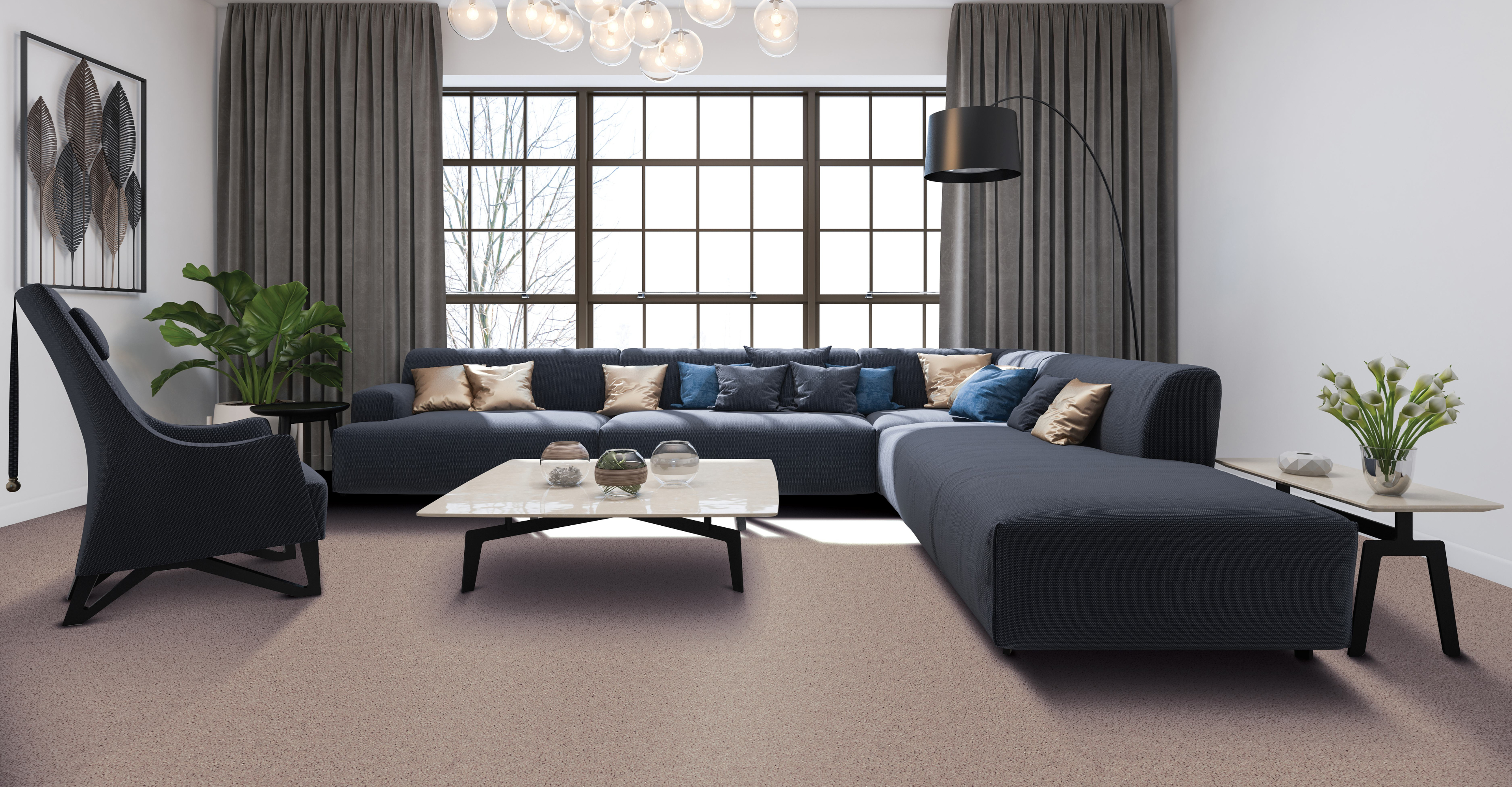 Stylish window treatments featuring heavy dark gray curtains in a contemporary living room with a cozy carpeted floor.