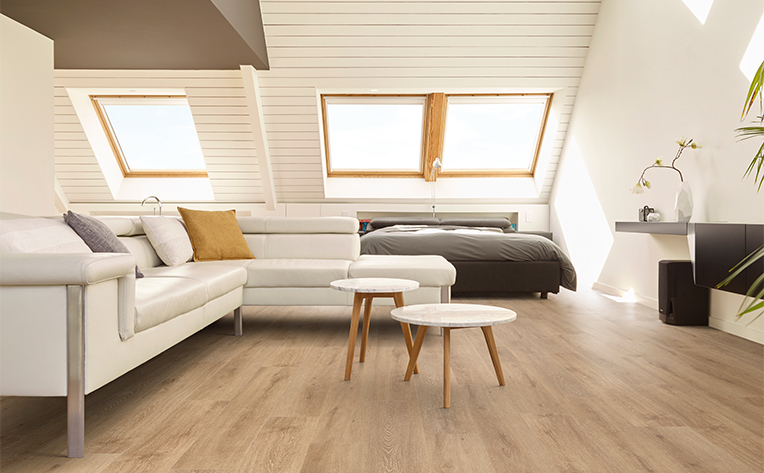 vinyl flooring in bedroom with large ceiling window